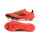 Crampons adidas F50 + Elite FG Turbo Noir Aurore Platin Métallique